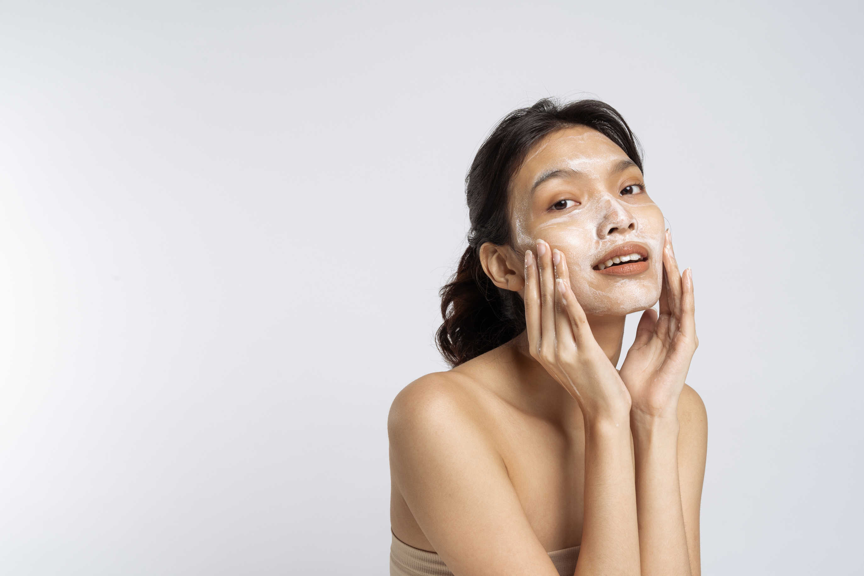 Young Woman Washing Face